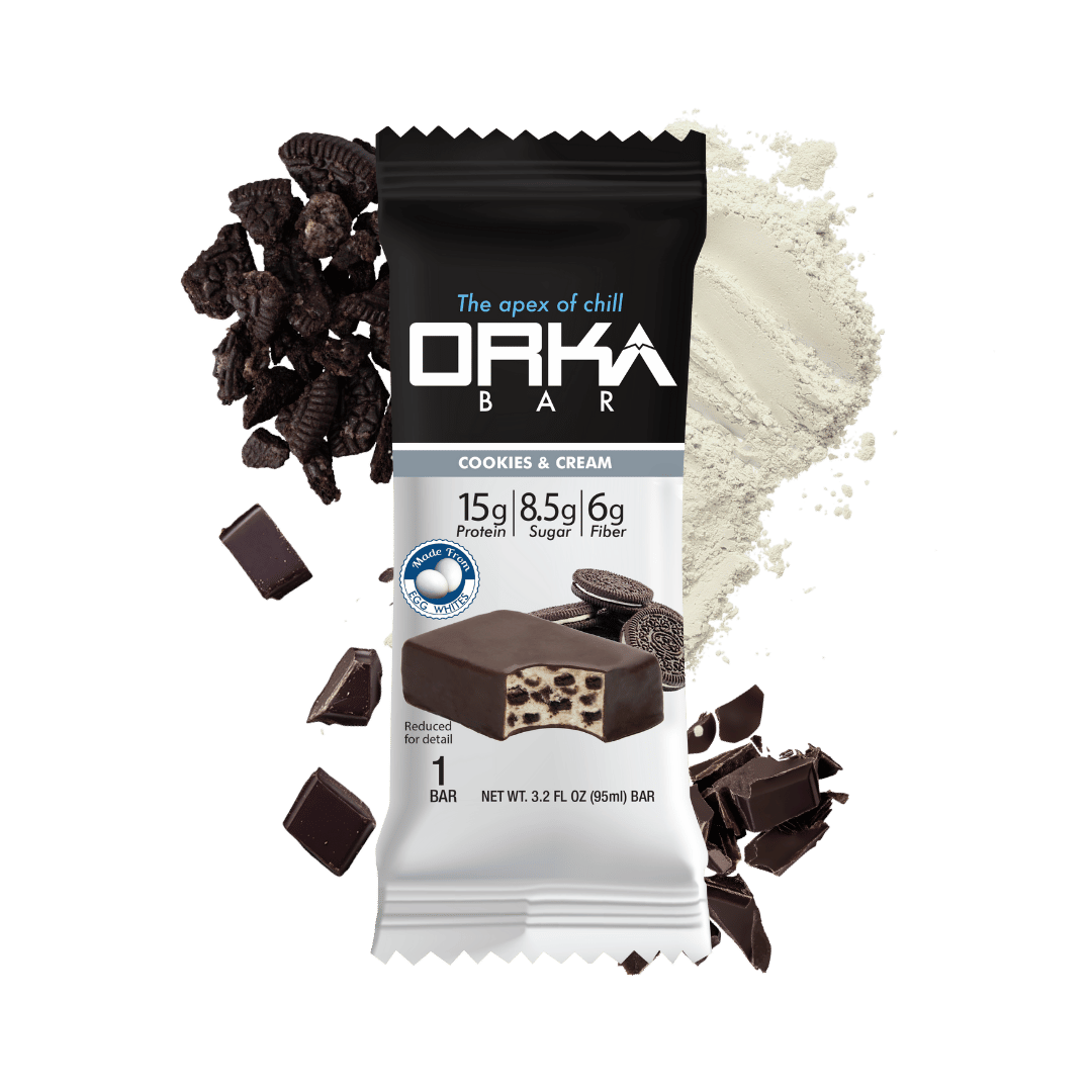 Orka Bar packaging with cookies, cream flavor details on a green background