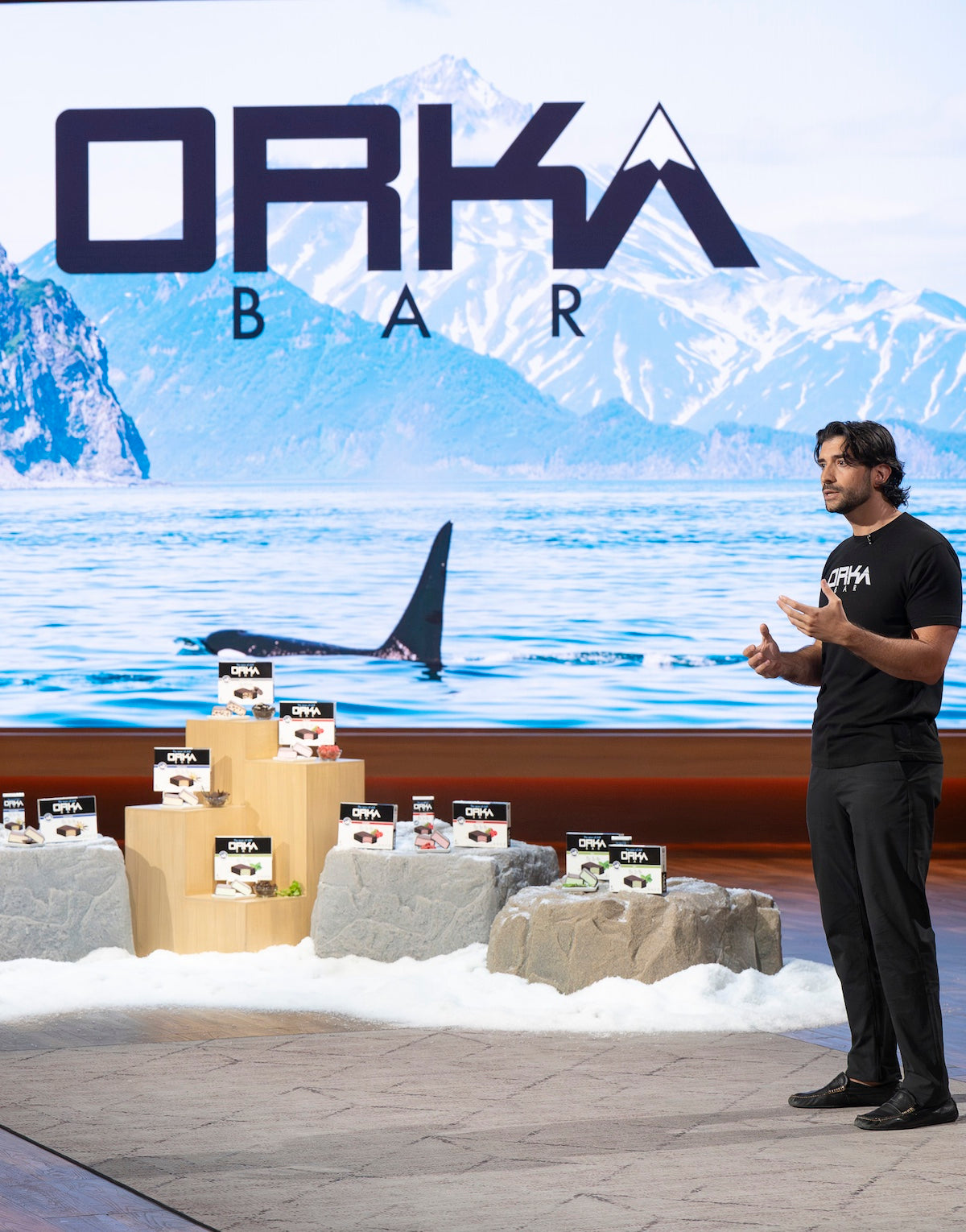 Stephen presenting on Shark Tank in front of Orka Bar display