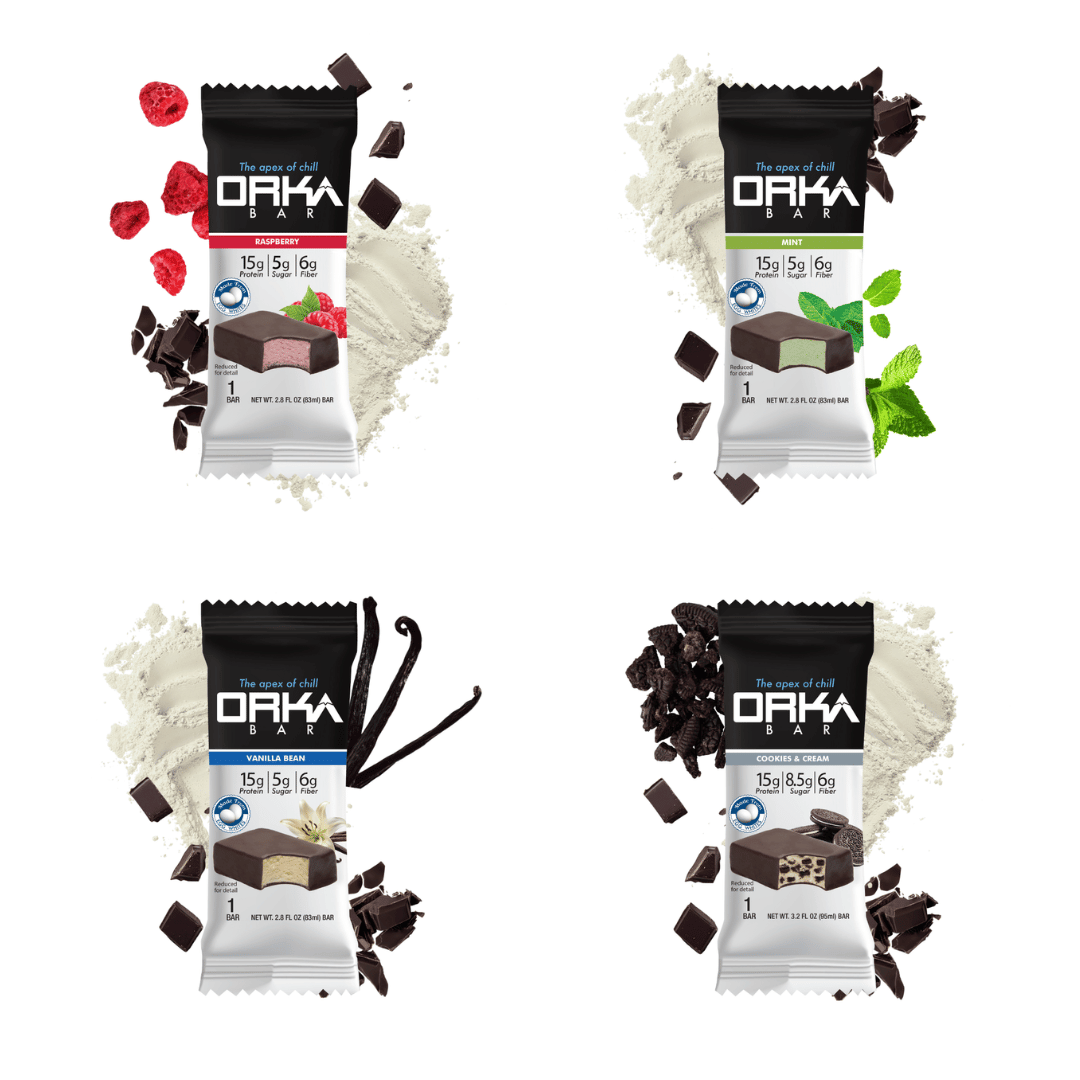 Four Orka protein bar packages with different flavors on a white background.